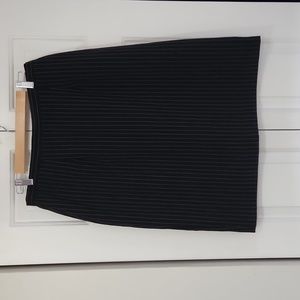 Size 16 polyester black and white striped skirt.